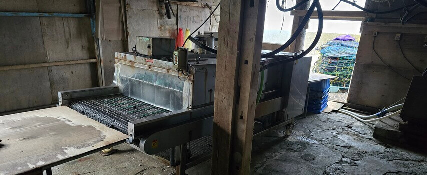 ホタテ漁業 カゴの洗浄機